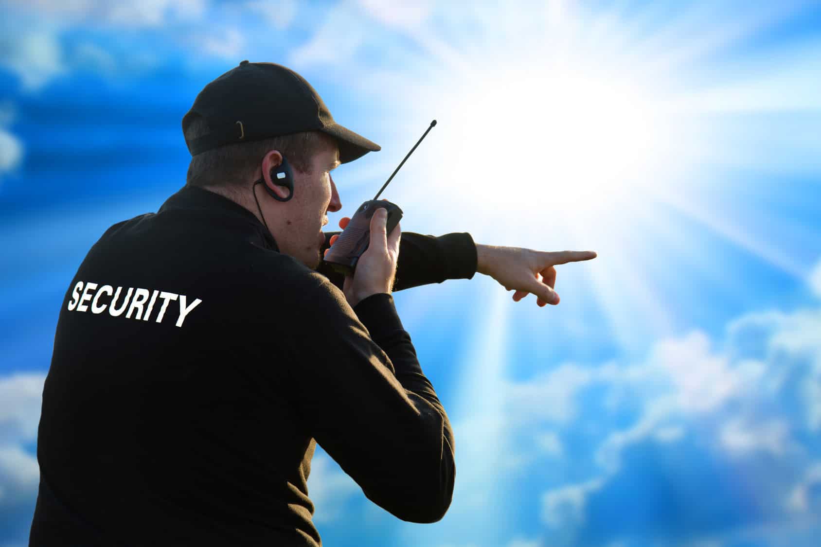 back of a security guard isolated on white